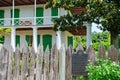 Wooden Fence, Historic Marker and Corner Gallery of Pitot House in New Orleans Royalty Free Stock Photo