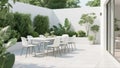 Modern outdoor dining space white table and sleek grey chairs on a bright patio, perfect for al fresco meals and relaxed social ga Royalty Free Stock Photo