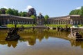 New palace with water basin upper grotto and statues in park at Hermitage (Eremitage) Museum in Royalty Free Stock Photo