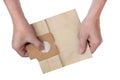 A new paper bag for dust from a vacuum cleaner in the hands of a Royalty Free Stock Photo