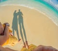 New parents cherish a beach day with their newborn a heartwarming family moment by the shore