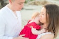 New parents with cute baby girl outdoors Royalty Free Stock Photo