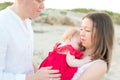 New parents with sleeping baby outdoors Royalty Free Stock Photo