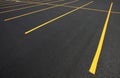 New Parking lot with yellow stripes to mark the parking stalls.