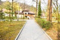 New pathway and beautiful trees track for running or walking and cycling relax in the park on green grass field in the city park Royalty Free Stock Photo