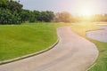 New pathway and beautiful trees track for running or walking and cycling relax in the park on green Royalty Free Stock Photo