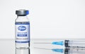 STARIY OSKOL, RUSSIA - NOVEMBER 23, 2020: New Pfizer vaccine and syringe on white background conceptual photo