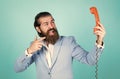 New phone and improved. Male talking on landline phone. vintage technology in modern life. line is busy. Fellow On The Royalty Free Stock Photo