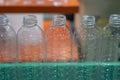 The new plastic bottles on the conveyor belt. Royalty Free Stock Photo