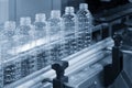 The new plastic bottles in the conveyor belt Royalty Free Stock Photo