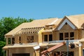 new plywood house under construction frame plank window wall framework roofing plank wall wood site material Royalty Free Stock Photo