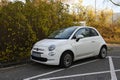 New small white car Fiat 600 parked front left side view