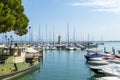 Old port Porto Vecchio in Desenzano with an old lighthouse Royalty Free Stock Photo