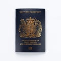 new post Brexit blue British passport on white background, Devon United Kingdom January 28 2021