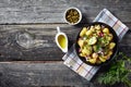 New potato salad with red onion, capers, greens Royalty Free Stock Photo