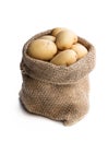 New potatoes in sackcloth bag isolated on white Royalty Free Stock Photo