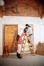 New property owners, young couple moving to new home, apartment, look happy Royalty Free Stock Photo