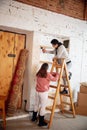 New property owners, young couple moving to new home, apartment, look happy Royalty Free Stock Photo