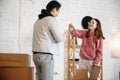 New property owners, young couple moving to new home, apartment, look happy Royalty Free Stock Photo