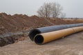 The new propylene pipeline DN 350 and DN 500 prepared for laying in a trench and for pumping oil and gas for an oil refinery