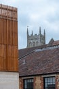 The new Queen Elizabeth Music School at King`s Bruton school In Somerset. Tower of St Mary`s Church in the distance. Royalty Free Stock Photo