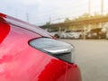 TheÃ¢â¬â¹ new red car in the parked with many cars on parking lot Royalty Free Stock Photo