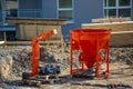 A new red comcrete bomb standing on an construction site Royalty Free Stock Photo