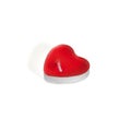New red decorative candle in the form of a heart isolated on a white background Royalty Free Stock Photo