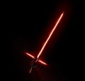 New red light saber holdng in hand on black.