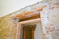 New reinforced brick lintel useful for creating a new door, or a new window, in an old stone and brick wall in a construction site Royalty Free Stock Photo