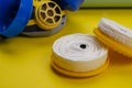 New replacement filters and Industrial respirator on yellow background