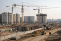 New residential complex under construction with cranes Royalty Free Stock Photo