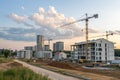 New residential complex under construction with cranes Royalty Free Stock Photo