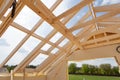 New residential construction home framing against a blue sky. Roofing construction. Wooden construction. Royalty Free Stock Photo