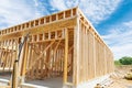 New residential construction home framing against a blue sky roofing construction wooden construction Royalty Free Stock Photo