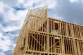 New residential construction home framing against a blue sky roofing construction wooden construction Royalty Free Stock Photo