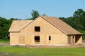 New residential construction home framing home against a blue sky Royalty Free Stock Photo