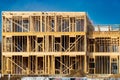 New residential construction home framing against sky Royalty Free Stock Photo