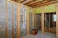 New residential construction home framing with basement view Royalty Free Stock Photo