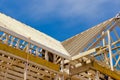 New residential construction home framing with a roof view Royalty Free Stock Photo