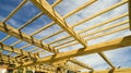 New residential construction house framing against a blue sky Royalty Free Stock Photo