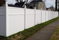 New resin fence in residential neighborhood.