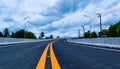 The new road and the bride across the railroad in the countryside of Thailand. Royalty Free Stock Photo