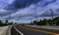 The new road and the bride across the railroad in the countryside of Thailand. Royalty Free Stock Photo