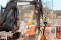 New road construction and kerb line installation by groundworkers on new housing development building site Royalty Free Stock Photo