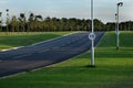 New road with speed restriction sign.