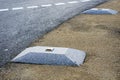 New roadside enclosures in the form of a concrete elevation with a reflective road stud Royalty Free Stock Photo