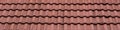 New roof with ceramic tiles, Orange roof tiles - European rounded roof-tiles, Brown terra cotta roof tiles texture and background