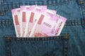 New 2000 rupee notes in an Indian mans jean back pocket. Royalty Free Stock Photo