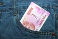 New 2000 rupee notes in an Indian mans jean front pocket. Royalty Free Stock Photo